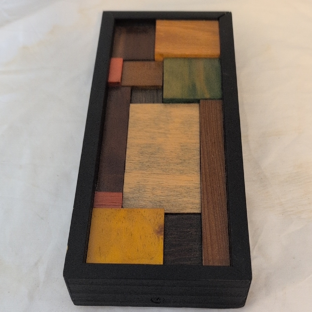 Colorful Wooden Puzzle in Black Frame